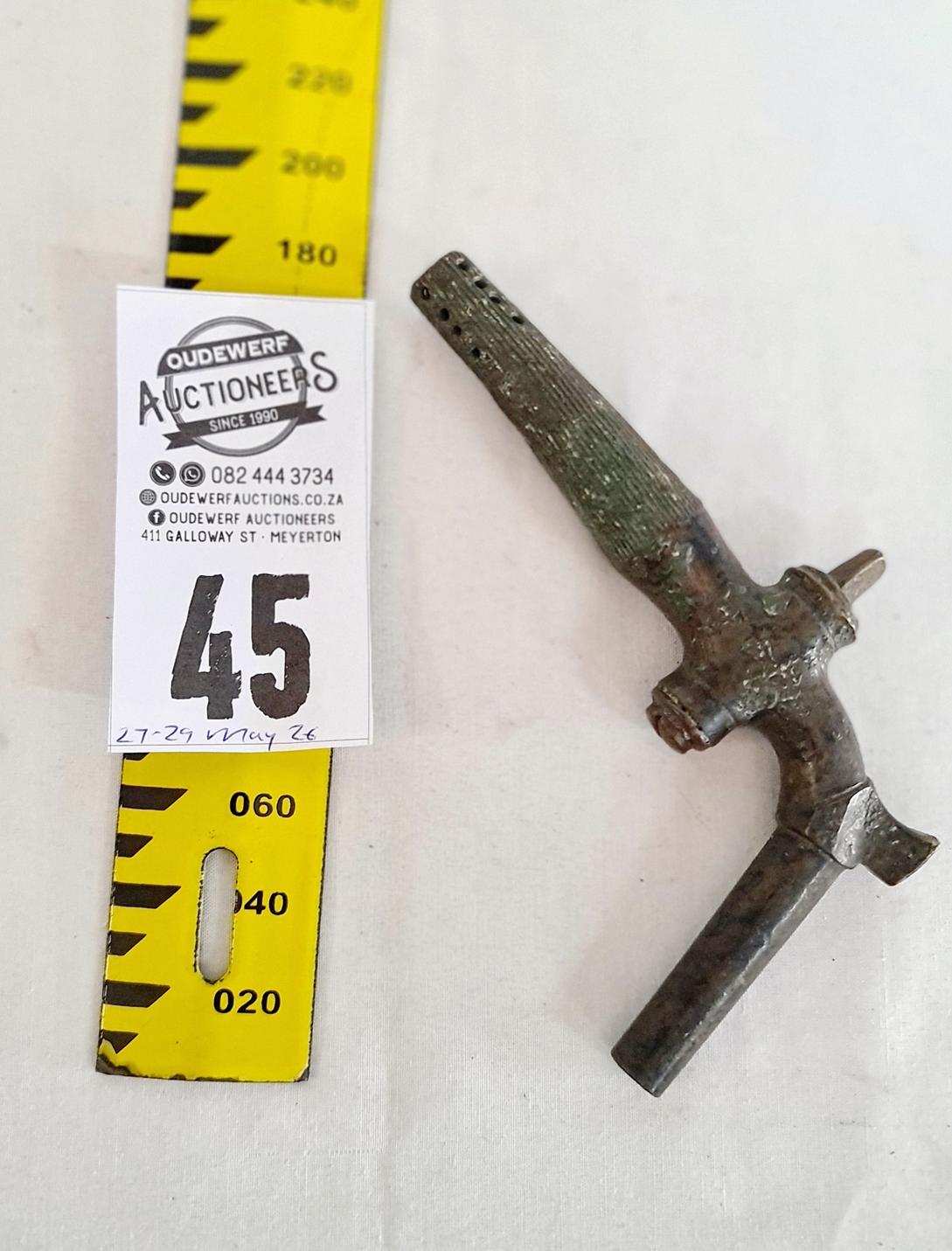 45.  Antique brass tap used for barrels